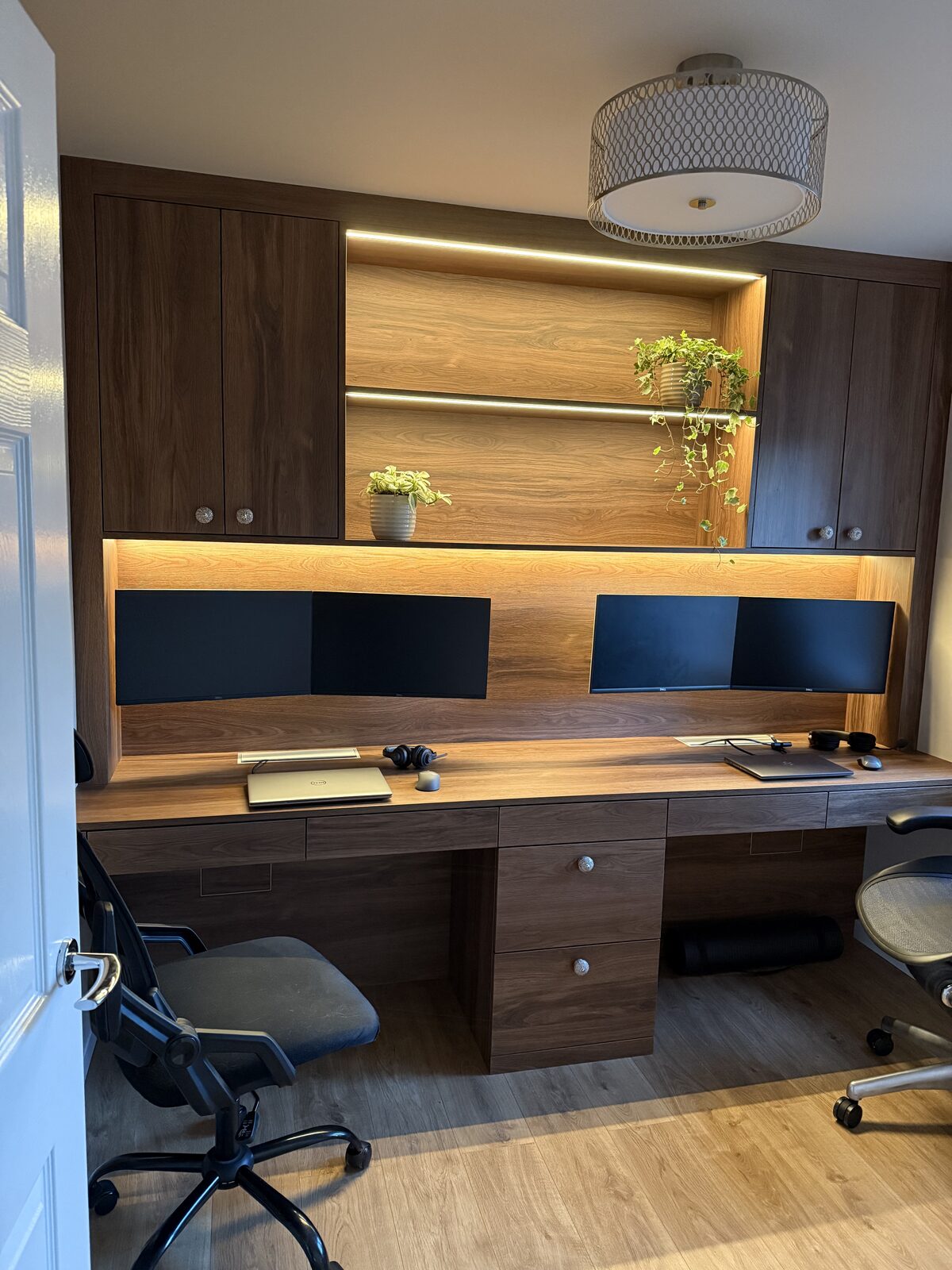 Bespoke walnut home office with integrated lighting